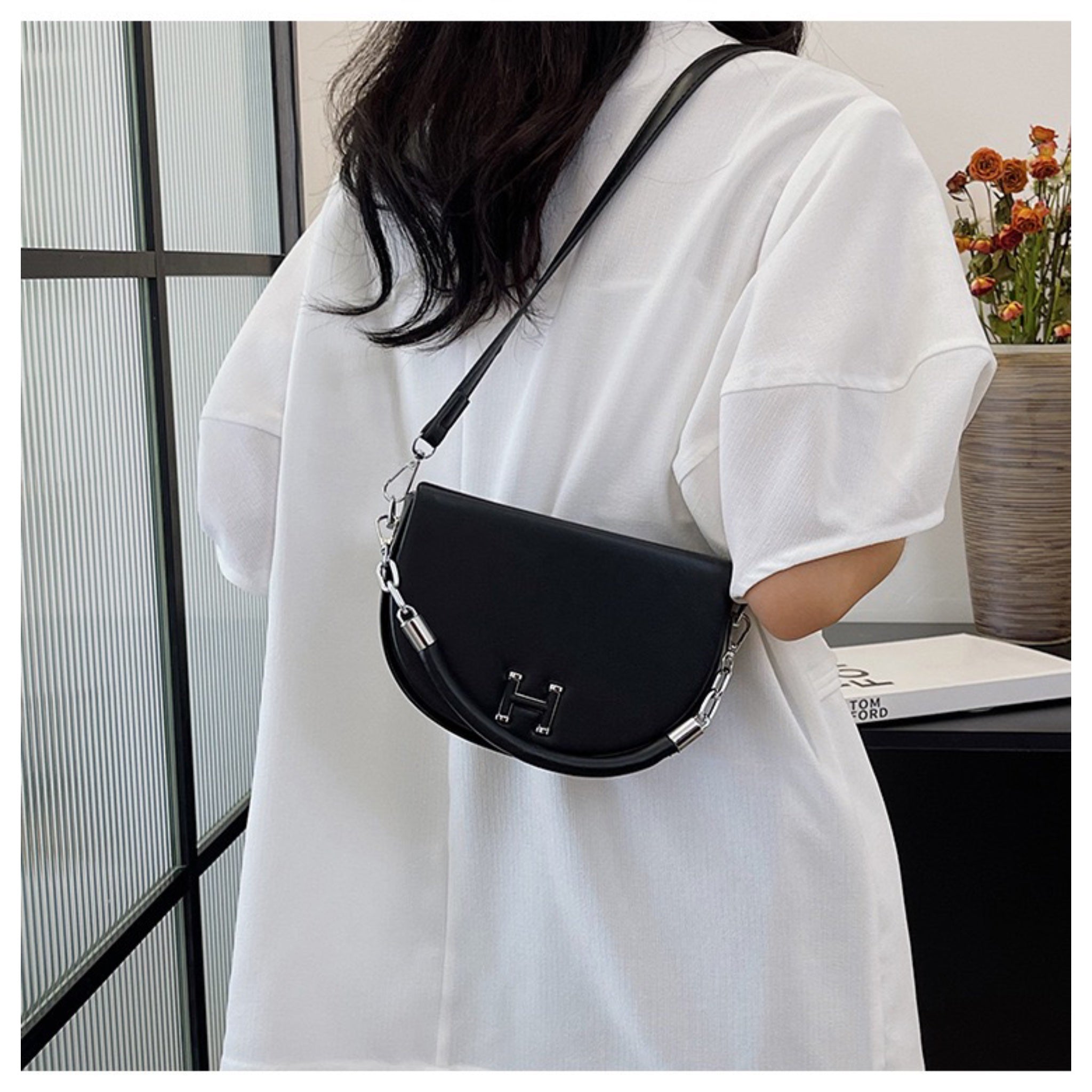 Black Vita Sling Bag